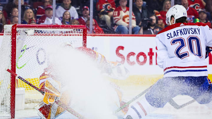 Mar 16, 2024; Calgary, Alberta, CAN; Calgary Flames goaltender Dustin Wolf (32) makes a save against