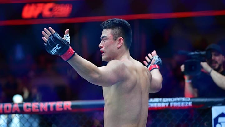 Zhang Mingyang celebrates his KO victory against Brendson Ribeiro