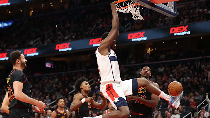 Feb 21, 2020; Washington, District of Columbia, USA; Washington Wizards center Thomas Bryant (13) dunks the ball as Cleveland Cavaliers center Tristan Thompson (13) looks on in the fourth quarter at Capital One Arena. Mandatory Credit: Geoff Burke-Imagn Images Feb 21, 2020; Washington, District of Columbia, USA; Washington Wizards center Thomas Bryant (13) dunks the ball as Cleveland Cavaliers center Tristan Thompson (13) looks on in the fourth quarter at Capital One Arena. Mandatory Credit: Geoff Burke-Imagn Images