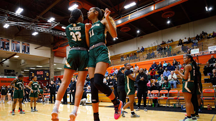 Washington's Kira Reynolds (11) is introduced before the IHSAA Class 4A, Sectional 