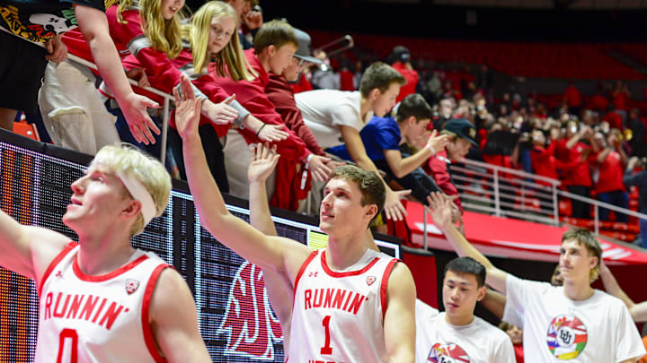 Dec 29, 2023; Salt Lake City, Utah, USA; The Utah Utes thank the fans after defeating the Washington