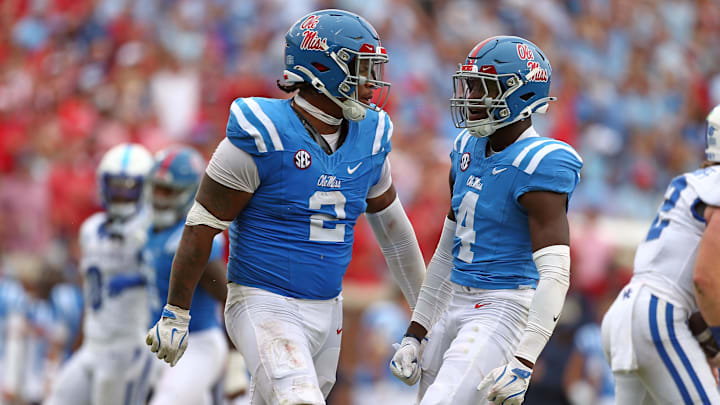 Sep 28, 2024; Oxford, Mississippi, USA; Mississippi Rebels defensive linemen Walter Nolen (2) and linebacker Suntarine Perkins (4) reacts after a tackle during the second half against the Kentucky Wildcats at Vaught-Hemingway Stadium. Mandatory Credit: Petre Thomas-Imagn Images Sep 28, 2024; Oxford, Mississippi, USA; Mississippi Rebels defensive linemen Walter Nolen (2) and linebacker Suntarine Perkins (4) reacts after a tackle during the second half against the Kentucky Wildcats at Vaught-Hemingway Stadium. Mandatory Credit: Petre Thomas-Imagn Images