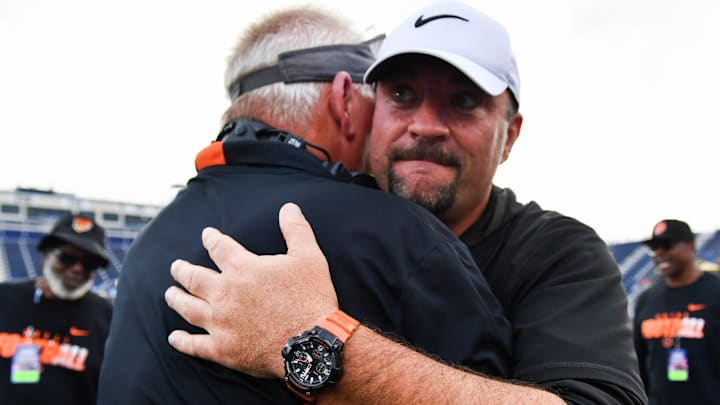 Cocoa football head coach Ryan Schneider hugs assistant coach Dan Diesel after the Tigers defeated Gadsden County in the FHSAA football Class 2A state championship Thursday, December 12, 2024. Craig Bailey/FLORIDA TODAY via USA TODAY NETWORK