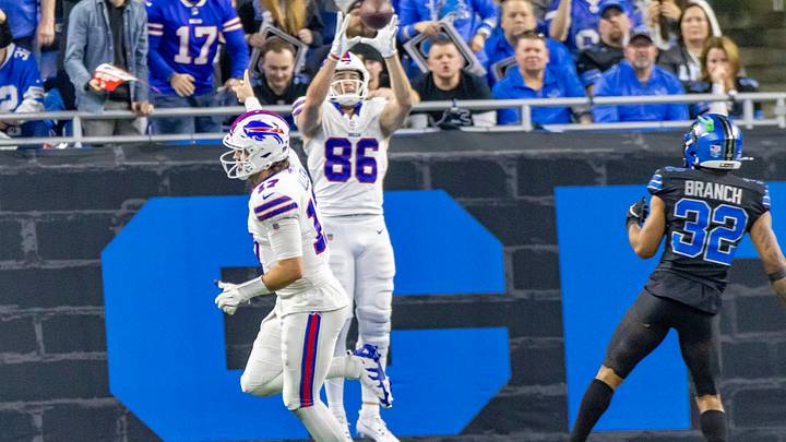 Dec. 15, 2024; Detroit, Michigan, USA; Buffalo Bills' quarterback Josh Allen (17) side arm tosses the ball to tight end Dalton Kincaid (86) for a touchdown against the Detroit Lions during the second half at Ford Field. Mandatory Credit: David Reginek-Imagn Images Dec. 15, 2024; Detroit, Michigan, USA; Buffalo Bills' quarterback Josh Allen (17) side arm tosses the ball to tight end Dalton Kincaid (86) for a touchdown against the Detroit Lions during the second half at Ford Field. Mandatory Credit: David Reginek-Imagn Images