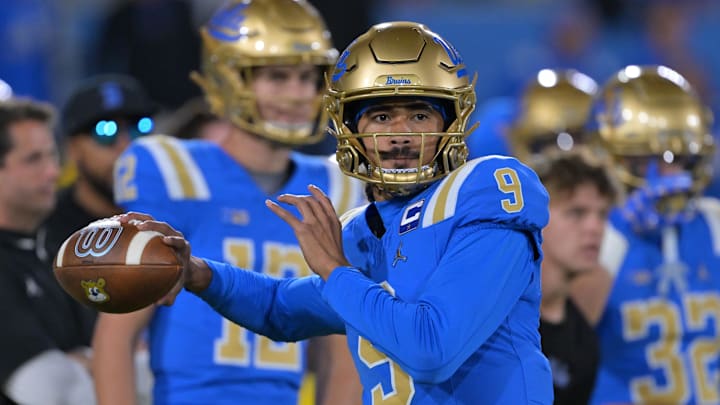 Nov 22, 2025; Pasadena, California, USA;  UCLA Bruins quarterback Nico Iamaleava (9) warms up prior to the game against the Washington Huskies at the Rose Bowl. Mandatory Credit: Jayne Kamin-Oncea-Imagn Images