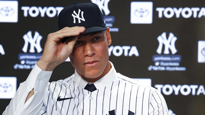 Dec 21, 2022; Bronx, New York, USA; Aaron Judge adjusts his hat during a press conference after being named captain at Yankee Stadium. Mandatory Credit: Jessica Alcheh-Imagn Images Dec 21, 2022; Bronx, New York, USA; Aaron Judge adjusts his hat during a press conference after being named captain at Yankee Stadium. Mandatory Credit: Jessica Alcheh-Imagn Images