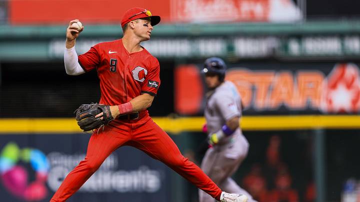 Jun 13, 2026; Cincinnati, Ohio, USA; Cincinnati Reds second baseman Matt McLain (9) fields the ball hit by Arizona Diamondbacks outfielder Corbin Carroll (not pictured) in the seventh inning at Great American Ball Park. Mandatory Credit: Katie Stratman-Imagn Images
