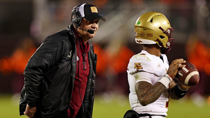 Oct 17, 2024; Blacksburg, Virginia, USA; Boston College Eagles head coach Bill O'Brien talks to quarterback Thomas Castellanos (1) during a time out against the Virginia Tech Hokies at Lane Stadium. Mandatory Credit: Peter Casey-Imagn Images