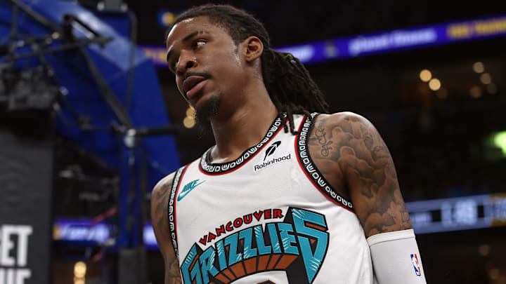 Apr 18, 2025; Memphis, Tennessee, USA; Memphis Grizzlies guard Ja Morant (12) reacts during the fourth quarter against the Dallas Mavericks at FedExForum. Mandatory Credit: Petre Thomas-Imagn Images