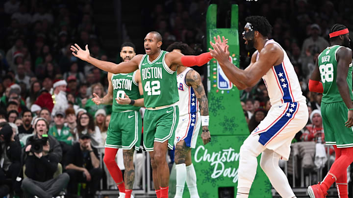 Dec 25, 2024; Boston, Massachusetts, USA; Boston Celtics center Al Horford (42) and Philadelphia 76ers center Joel Embiid (21) react to the official’s call during the second half at TD Garden. Mandatory Credit: Eric Canha-Imagn Images