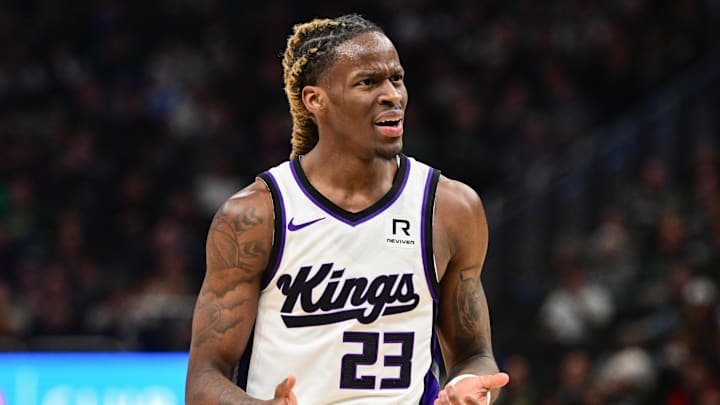 Jan 14, 2025; Milwaukee, Wisconsin, USA; Sacramento Kings guard Keon Ellis (23) reacts after a foul call in the fourth quarter against the Sacramento Kings at Fiserv Forum. Mandatory Credit: Benny Sieu-Imagn Images