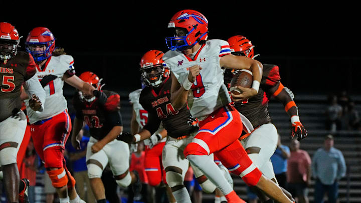 October 6, 2022; Phoenix, Ariz; USA; Westwood quarterback Giordan Hanks (9) scrambles against Trevor Browne during a game at Trevor Browne High School.

High School Football Trevor Browne Football Westwood At Trevor Browne