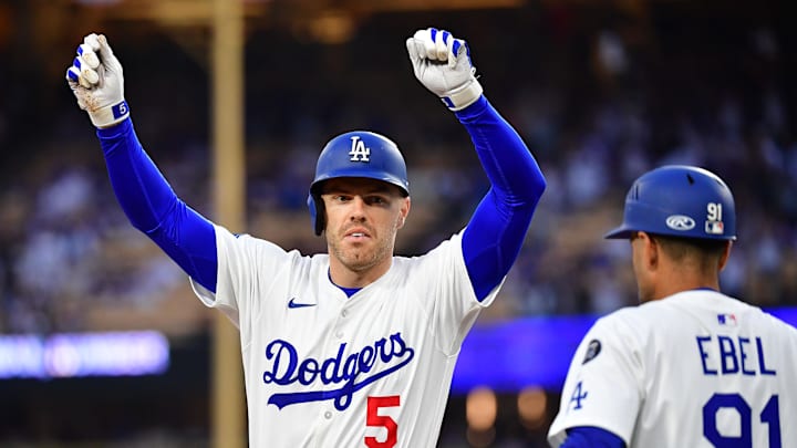 Jun 3, 2025; Los Angeles, California, USA; Los Angeles Dodgers first base Freddie Freeman (5) reacts after hitting a RBI single against the New York Mets  during the first inning at Dodger Stadium. Mandatory Credit: Gary A. Vasquez-Imagn Images