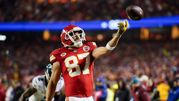 Nov 20, 2023; Kansas City, Missouri, USA; Kansas City Chiefs tight end Travis Kelce (87) tosses the