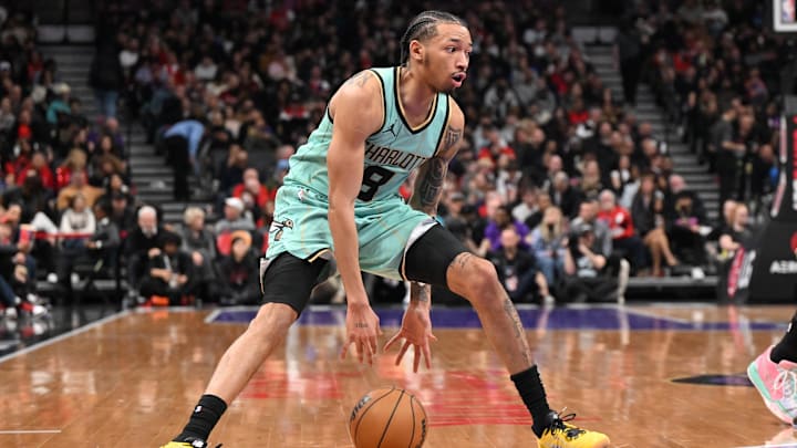 Mar 28, 2025; Toronto, Ontario, CAN; Charlotte Hornets guard Nick Smith Jr. (8) controls the ball against the Toronto Raptors in the second half at Scotiabank Arena. Mandatory Credit: Dan Hamilton-Imagn Images Mar 28, 2025; Toronto, Ontario, CAN; Charlotte Hornets guard Nick Smith Jr. (8) controls the ball against the Toronto Raptors in the second half at Scotiabank Arena. Mandatory Credit: Dan Hamilton-Imagn Images