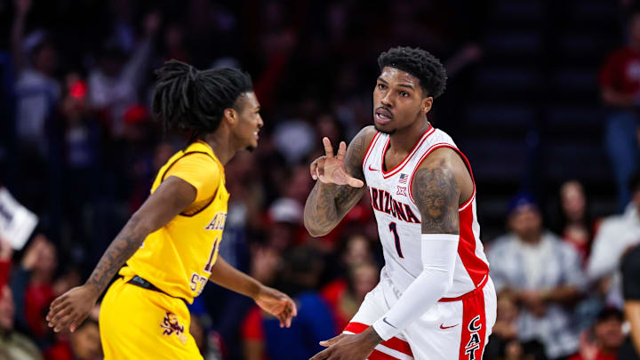 Mar 4, 2025; Tucson, Arizona, USA; Arizona Wildcats guard Caleb Love (1) holds up a three after he shoots a three-point shot during the first half against Arizona State at McKale Center. Mandatory Credit: Aryanna Frank-Imagn Images