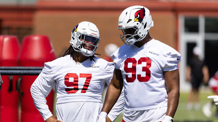 Jun 10, 2025; Tempe, AZ, USA; Arizona Cardinals defensive lineman Walter Nolen III (97) talks with Calais Campbell (93) during minicamp at the teams Arizona Cardinals Training Facility. Mandatory Credit: Mark J. Rebilas-Imagn Images Jun 10, 2025; Tempe, AZ, USA; Arizona Cardinals defensive lineman Walter Nolen III (97) talks with Calais Campbell (93) during minicamp at the teams Arizona Cardinals Training Facility. Mandatory Credit: Mark J. Rebilas-Imagn Images