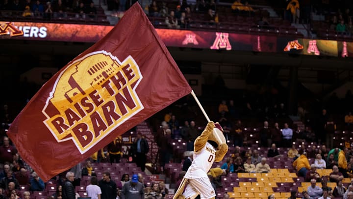 Nov 30, 2015; Minneapolis, MN, USA; Minnesota Gophers mascot Goldy Gopher waves the raise the barn flag before the game between the Minnesota Gophers and Clemson Tigers at Williams Arena. Mandatory Credit: Brad Rempel-Imagn Images