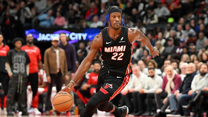 Dec 1, 2024; Toronto, Ontario, CAN; Miami Heat forward Jimmy Butler (22) dribbles the ball against the Toronto Raptors in the first half at Scotiabank Arena. Mandatory Credit: Dan Hamilton-Imagn Images Dec 1, 2024; Toronto, Ontario, CAN; Miami Heat forward Jimmy Butler (22) dribbles the ball against the Toronto Raptors in the first half at Scotiabank Arena. Mandatory Credit: Dan Hamilton-Imagn Images