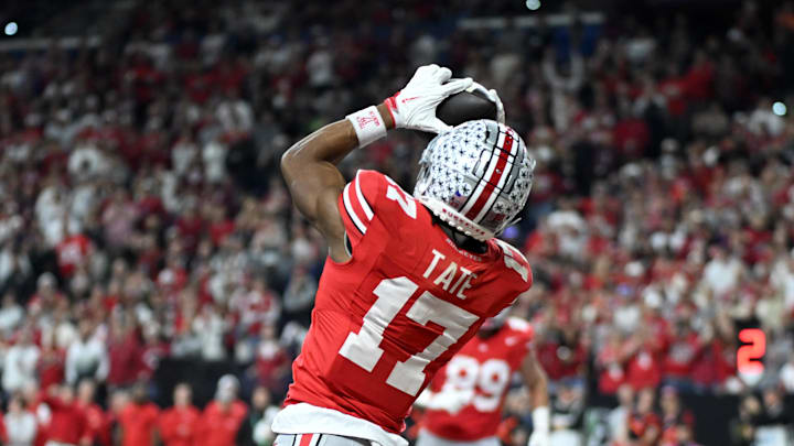 Dec 6, 2025; Indianapolis, IN, USA; Ohio State Buckeyes wide receiver Carnell Tate (17) scores a touchdown against the Indiana Hoosiers in the first quarter during the 2025 Big Ten championship game at Lucas Oil Stadium. Mandatory Credit: Robert Goddin-Imagn Images