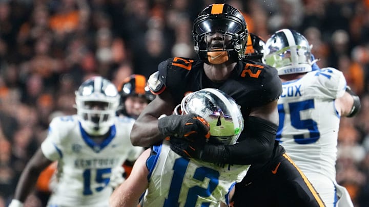 Tennessee defensive lineman James Pearce Jr. (27) takes down Kentucky quarterback Brock Vandagriff (12) during an NCAA college football game between Tennessee and Kentucky on Saturday, Nov. 2, 2024, in Knoxville, Tenn.