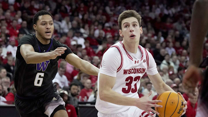Wisconsin guard Jack Janicki (33) drives down the lane during the second half of their game Tuesday, February 25, 2025 at the Kohl Center in Madison, Wisconsin. Wisconsin beat Washington 88-62. Wisconsin guard Jack Janicki (33) drives down the lane during the second half of their game Tuesday, February 25, 2025 at the Kohl Center in Madison, Wisconsin. Wisconsin beat Washington 88-62.