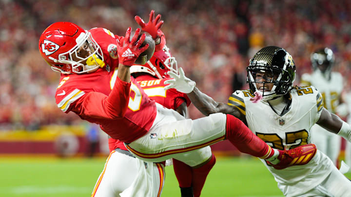 Oct 7, 2024; Kansas City, Missouri, USA; Kansas City Chiefs safety Bryan Cook (6) intercepts a pass intended for New Orleans Saints wide receiver Rashid Shaheed (22) during the first half at GEHA Field at Arrowhead Stadium. Mandatory Credit: Jay Biggerstaff-Imagn Images Oct 7, 2024; Kansas City, Missouri, USA; Kansas City Chiefs safety Bryan Cook (6) intercepts a pass intended for New Orleans Saints wide receiver Rashid Shaheed (22) during the first half at GEHA Field at Arrowhead Stadium. Mandatory Credit: Jay Biggerstaff-Imagn Images