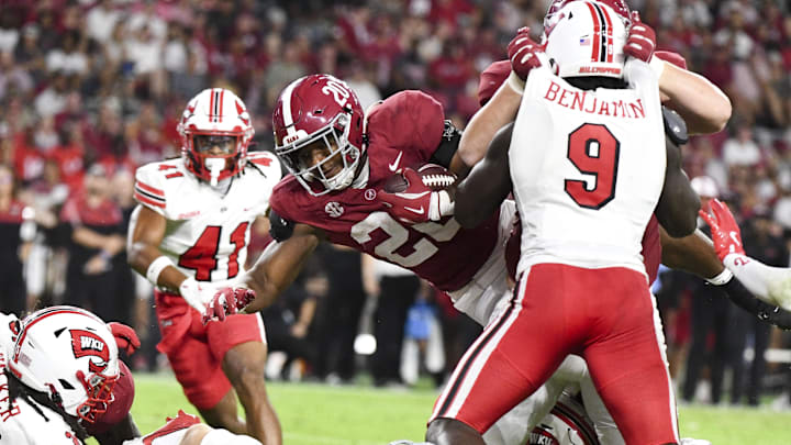 Aug 31, 2024; Tuscaloosa, Alabama, USA;  Alabama Crimson Tide running back Daniel Hill (20) makes a dive for the goal line but comes up short at Bryant-Denny Stadium during the game between the Alabama Crimson Tide and the Western Kentucky Hilltoppers. Alabama defeated Western Kentucky 63-0.