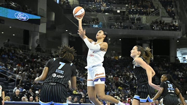 Jun 21, 2025; Chicago, Illinois, USA; Phoenix Mercury forward Satou Sabally (0) shoots against Chicago Sky during the first half at Wintrust Arena. Mandatory Credit: Matt Marton-Imagn Images