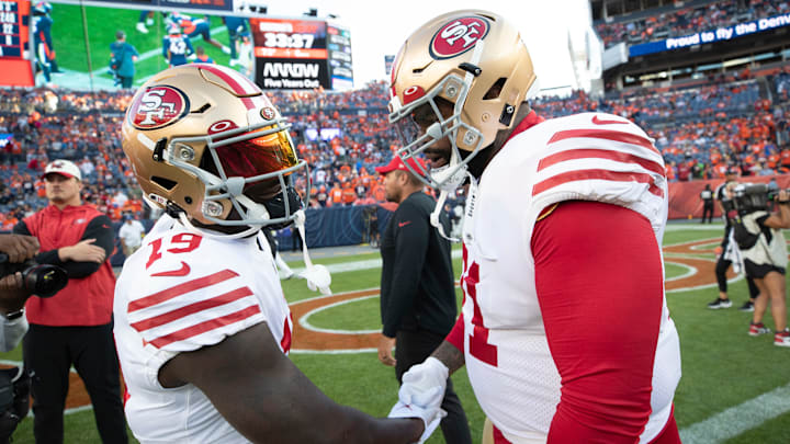 San Francisco 49ers wide receiver Deebo Samuel (L) and left tackle Trent Williams (R)