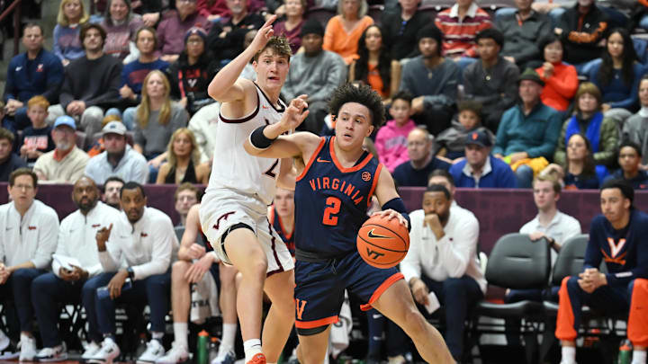 Dec 31, 2025; Blacksburg, Virginia, USA; Virginia Cavaliers guard Chance Mallory (2) drives the baseline as Virginia Tech Hokies guard Jaden Schutt (2) defends during the second half at Cassell Coliseum. Mandatory Credit: Brian Bishop-Imagn Images Dec 31, 2025; Blacksburg, Virginia, USA; Virginia Cavaliers guard Chance Mallory (2) drives the baseline as Virginia Tech Hokies guard Jaden Schutt (2) defends during the second half at Cassell Coliseum. Mandatory Credit: Brian Bishop-Imagn Images