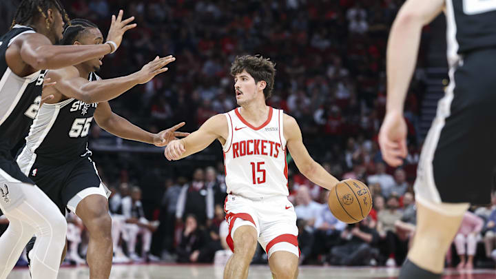 Nov 6, 2024; Houston, Texas, USA; Houston Rockets guard Reed Sheppard (15) dribbles the ball during the second half against the San Antonio Spurs at Toyota Center. Mandatory Credit: Troy Taormina-Imagn Images