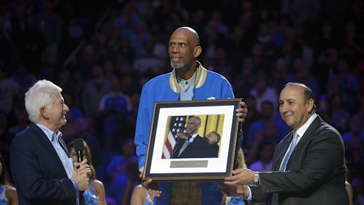UCLA Bruins former player Kareem Abdul-Jabbar presented a photograph of him receiving the Presidential Medal of Freedom . Mandatory Credit: Gary A. Vasquez-USA TODAY Sports