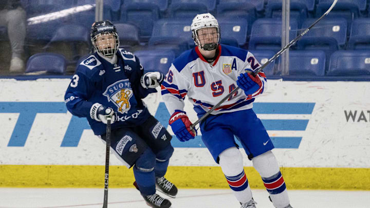 Feb 7, 2024; Plymouth, MI, USA; USA s Max Plante (26) turns up ice in front of Finland's Daniel Nieminen (3) during the third period of the 2024 U18 s Five Nations Tournament at USA Hockey Arena. Mandatory Credit: David Reginek-Imagn Images Feb 7, 2024; Plymouth, MI, USA; USA s Max Plante (26) turns up ice in front of Finland's Daniel Nieminen (3) during the third period of the 2024 U18 s Five Nations Tournament at USA Hockey Arena. Mandatory Credit: David Reginek-Imagn Images