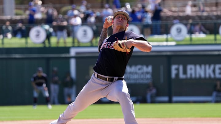 Cleveland Guardians starting pitcher Zach Plesac (34) pitches against the Los Angeles Dodgers during the first inning at Camelback Ranch-Glendale on March 13, 2023.