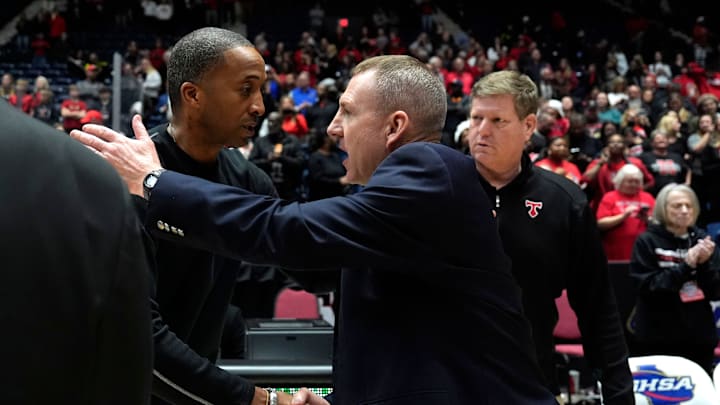Mar 6, 2025; Macon, Georgia, USA; North Oconee Head Coach Rick Rasmussen and Pace Academy Head Coach Sharman White hug after the North Oconee and Pace Academy boys AAAA state basketball championship game at the Macon Coliseum. North Oconee won 60-48. Mandatory Credit: Katie Goodale - Augusta Chronicle/USA TODAY NETWORK Mar 6, 2025; Macon, Georgia, USA; North Oconee Head Coach Rick Rasmussen and Pace Academy Head Coach Sharman White hug after the North Oconee and Pace Academy boys AAAA state basketball championship game at the Macon Coliseum. North Oconee won 60-48. Mandatory Credit: Katie Goodale - Augusta Chronicle/USA TODAY NETWORK
