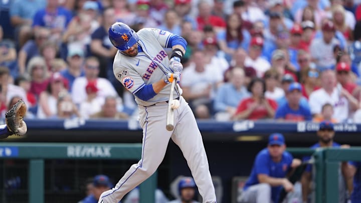 Sep 14, 2024; Philadelphia, Pennsylvania, USA; New York Mets designated hitter JD Martinez (28) hits a fly ball against the Philadelphia Phillies during the third inning at Citizens Bank Park. Mandatory Credit: Gregory Fisher-Imagn Images