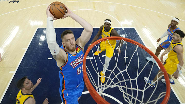 Jun 11, 2025; Indianapolis, Indiana, USA; Oklahoma City Thunder center Isaiah Hartenstein (55) dunks against the Indiana Pacers during the first half during game three of the 2025 NBA Finals at Gainbridge Fieldhouse. Mandatory Credit: Abbie Parr-Pool Photo via Imagn Images Jun 11, 2025; Indianapolis, Indiana, USA; Oklahoma City Thunder center Isaiah Hartenstein (55) dunks against the Indiana Pacers during the first half during game three of the 2025 NBA Finals at Gainbridge Fieldhouse. Mandatory Credit: Abbie Parr-Pool Photo via Imagn Images
