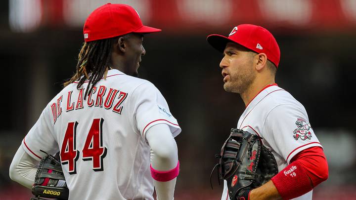 Jul 17, 2023; Cincinnati, Ohio, USA; Cincinnati Reds third baseman Elly De La Cruz (44) talks with first baseman Joey Votto (19) during the third inning against the San Francisco Giants at Great American Ball Park. Mandatory Credit: Katie Stratman-USA TODAY Sports Jul 17, 2023; Cincinnati, Ohio, USA; Cincinnati Reds third baseman Elly De La Cruz (44) talks with first baseman Joey Votto (19) during the third inning against the San Francisco Giants at Great American Ball Park. Mandatory Credit: Katie Stratman-USA TODAY Sports