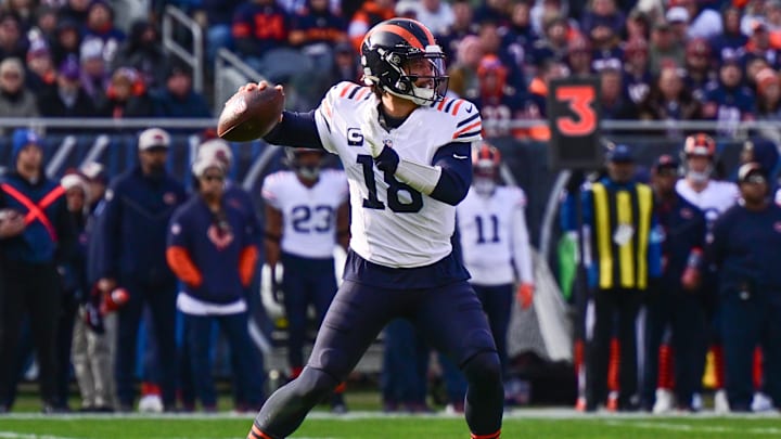 Nov 24, 2024; Chicago, Illinois, USA; Chicago Bears quarterback Caleb Williams (18) passes the ball against the Minnesota Vikings during the second quarter at Soldier Field. Mandatory Credit: Daniel Bartel-Imagn Images