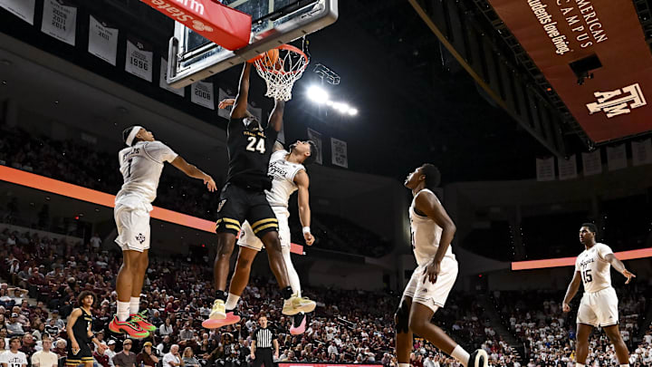 Vanderbilt Commodores forward JaQualon Roberts (24) dunks the ball during the second half against the Texas A&M Aggies at Reed Arena.