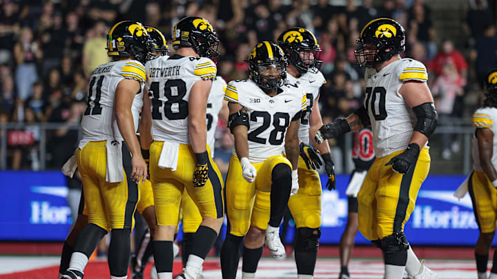 Sep 19, 2025; Piscataway, New Jersey, USA; Iowa Hawkeyes running back Kamari Moulton (28) celebrates his rushing touchdown with teammates during the first half against the Rutgers Scarlet Knights at SHI Stadium. Mandatory Credit: Vincent Carchietta-Imagn Images Sep 19, 2025; Piscataway, New Jersey, USA; Iowa Hawkeyes running back Kamari Moulton (28) celebrates his rushing touchdown with teammates during the first half against the Rutgers Scarlet Knights at SHI Stadium. Mandatory Credit: Vincent Carchietta-Imagn Images
