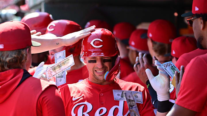 Sep 17, 2025; St. Louis, Missouri, USA; Cincinnati Reds teammates shower Cincinnati Reds first baseman Spencer Steer (7) with money in the dugout after he hit a three-run home run against the St. Louis Cardinals at Busch Stadium. Mandatory Credit: Tim Vizer-Imagn Images Sep 17, 2025; St. Louis, Missouri, USA; Cincinnati Reds teammates shower Cincinnati Reds first baseman Spencer Steer (7) with money in the dugout after he hit a three-run home run against the St. Louis Cardinals at Busch Stadium. Mandatory Credit: Tim Vizer-Imagn Images