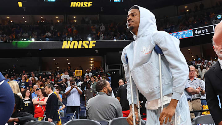Apr 26, 2025; Memphis, Tennessee, USA; Memphis Grizzlies guard Ja Morant (12) looks on during a time out during the fourth quarter against the Oklahoma City Thunder during game four for the first round of the 2024 NBA Playoffs at FedExForum. Mandatory Credit: Petre Thomas-Imagn Images