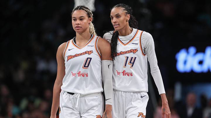 Sep 17, 2025; Brooklyn, New York, USA; Phoenix Mercury forward DeWanna Bonner (14) talks with forward Satou Sabally (0) during game two of round one for the 2025 WNBA Playoffs against the New York Liberty at Barclays Center. Mandatory Credit: Wendell Cruz-Imagn Images