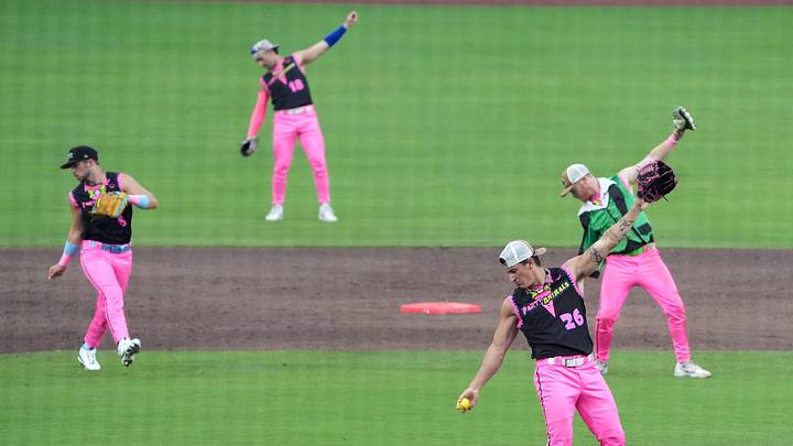 The Party Animals’ Nate Teller leads the group in the delivery of a pitch against The Visitors as the Savannah Bananas came back to Louisville Slugger Park this Thursday.
June 26, 2025