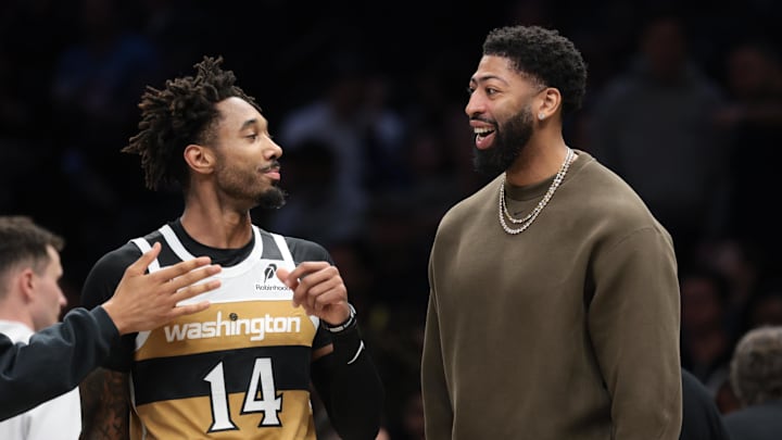 Apr 5, 2026; Brooklyn, New York, USA;  Washington Wizards forward Anthony Davis (23) talks with forward Leaky Black (14) during the first half against the Brooklyn Nets at Barclays Center. Mandatory Credit: Vincent Carchietta-Imagn Images