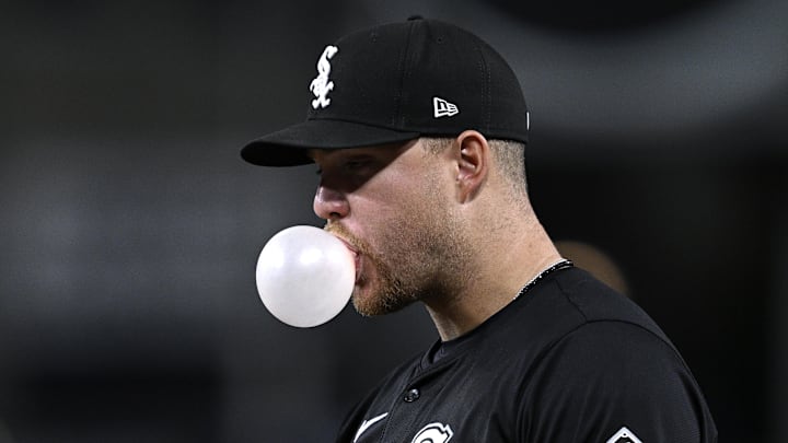 Chicago White Sox first baseman Gavin Sheets (32) blows a bubble-gum bubble during the sixth inning against the San Diego Padres at Petco Park in 2024.