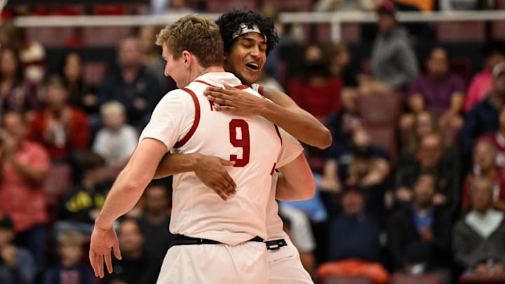 Jan 11, 2025; Stanford, California, USA; Stanford Cardinal guard Ryan Agarwal (11) hugs forward Cole Kastner (9) as he is substituted in against the Virginia Cavaliers in the second half at Maples Pavilion. Mandatory Credit: Eakin Howard-Imagn Images Jan 11, 2025; Stanford, California, USA; Stanford Cardinal guard Ryan Agarwal (11) hugs forward Cole Kastner (9) as he is substituted in against the Virginia Cavaliers in the second half at Maples Pavilion. Mandatory Credit: Eakin Howard-Imagn Images