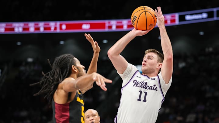 Mar 11, 2025; Kansas City, MO, USA; Kansas State Wildcats guard Brendan Hausen (11) shoots the ball over Arizona State Sun Devils guard Amier Ali (5) during the first half at T-Mobile Center. Mandatory Credit: William Purnell-Imagn Images Mar 11, 2025; Kansas City, MO, USA; Kansas State Wildcats guard Brendan Hausen (11) shoots the ball over Arizona State Sun Devils guard Amier Ali (5) during the first half at T-Mobile Center. Mandatory Credit: William Purnell-Imagn Images